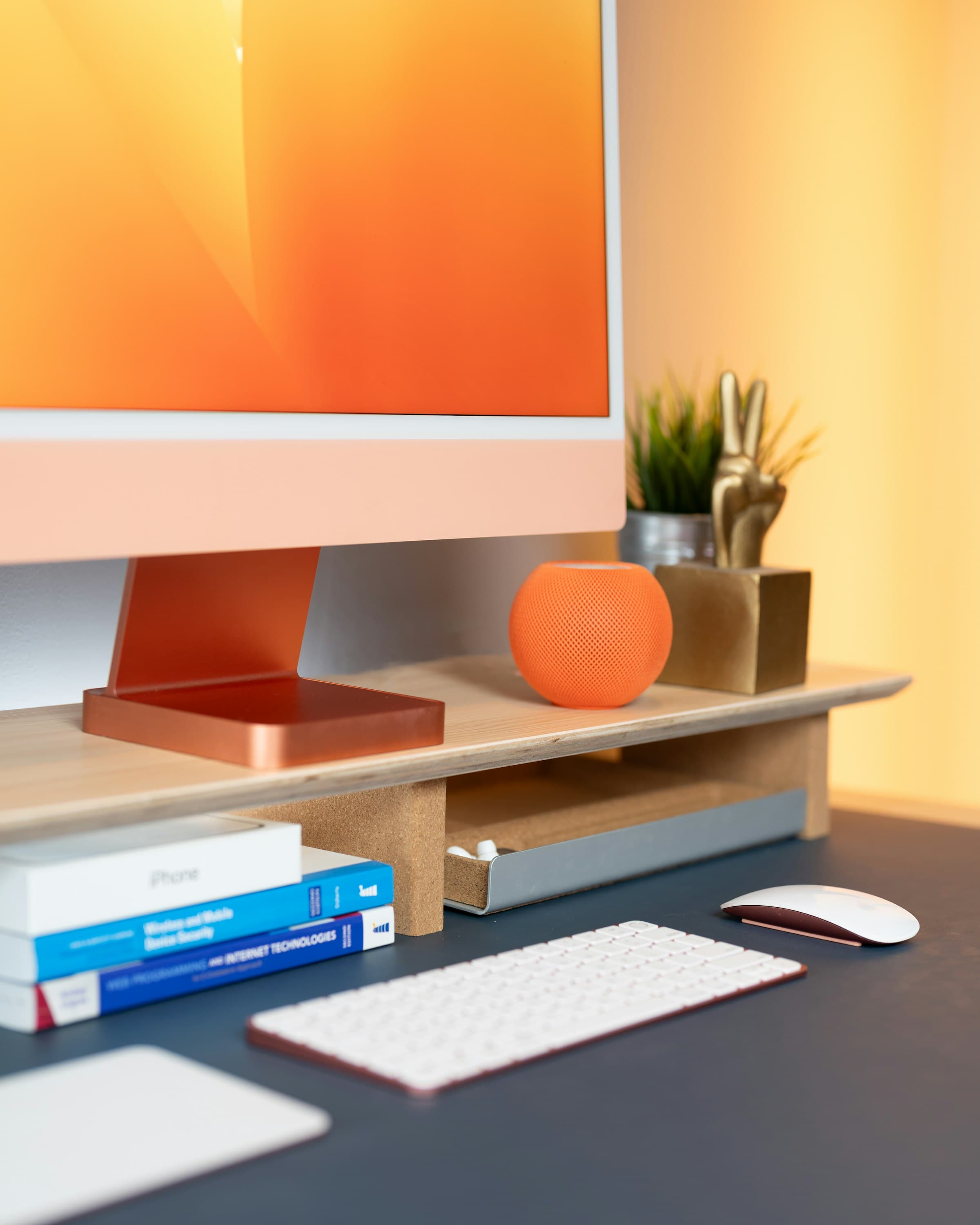 A colourful 24-inch iMac on a desk